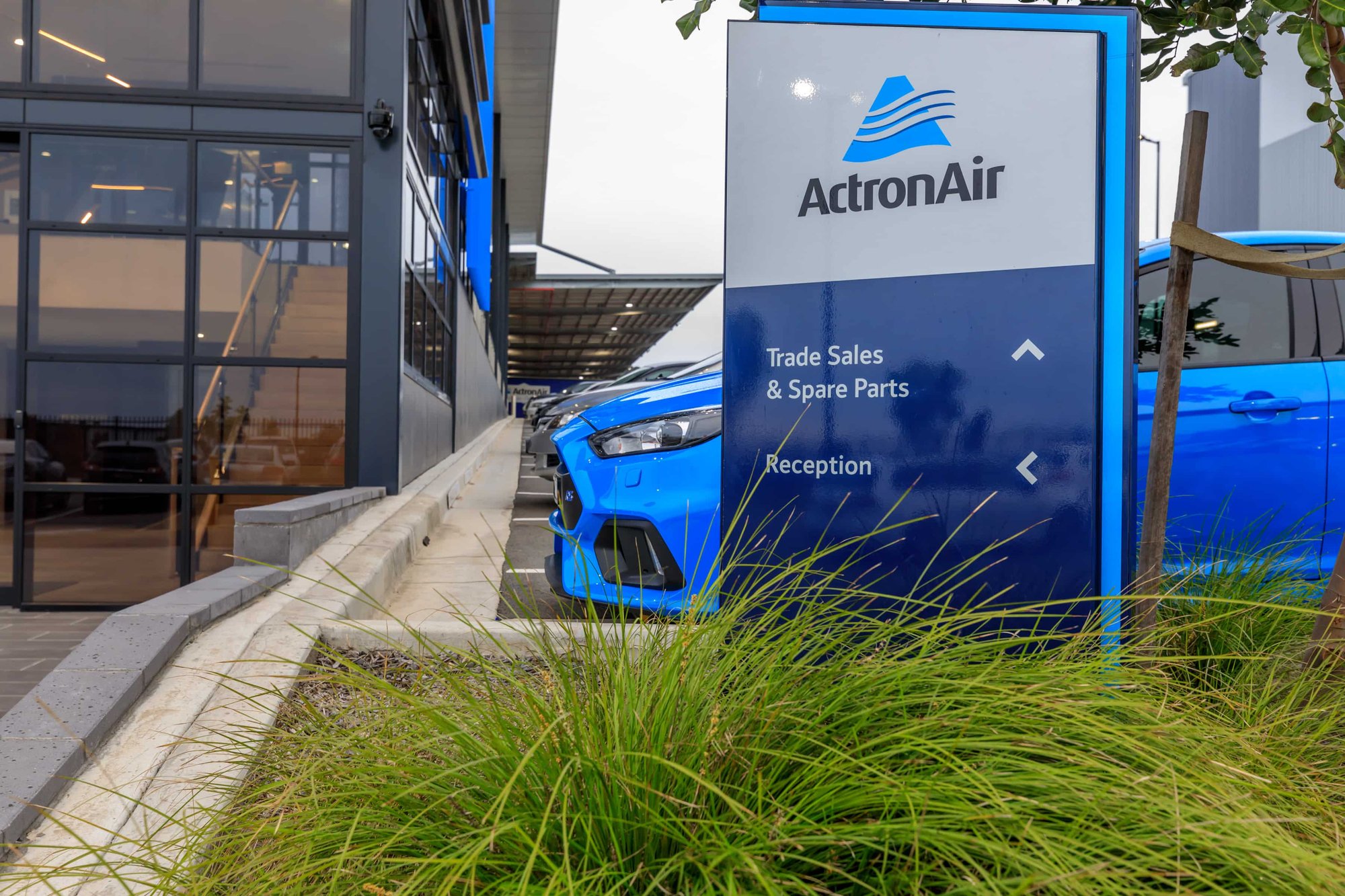 Directional signage and 3D branded signage at Actron Air