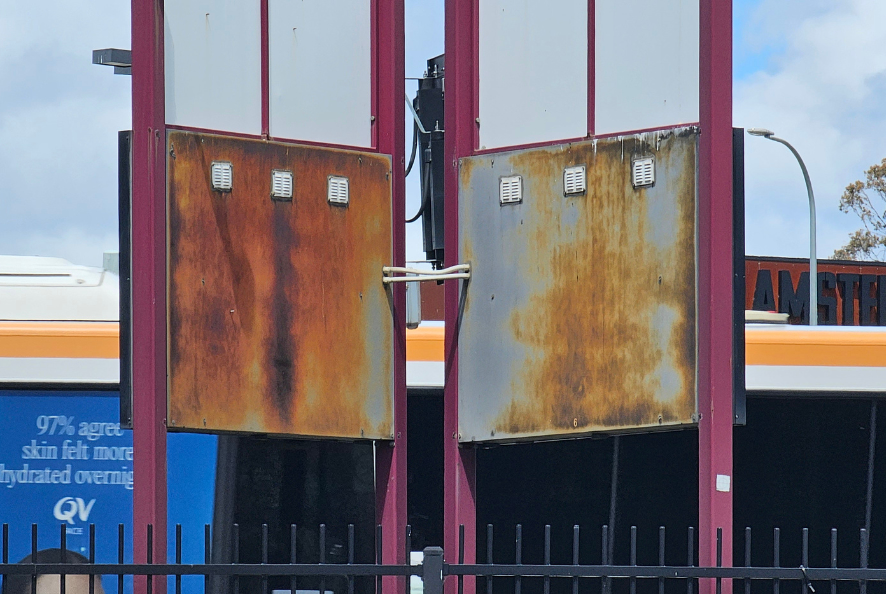 Update rusted or faded signage 