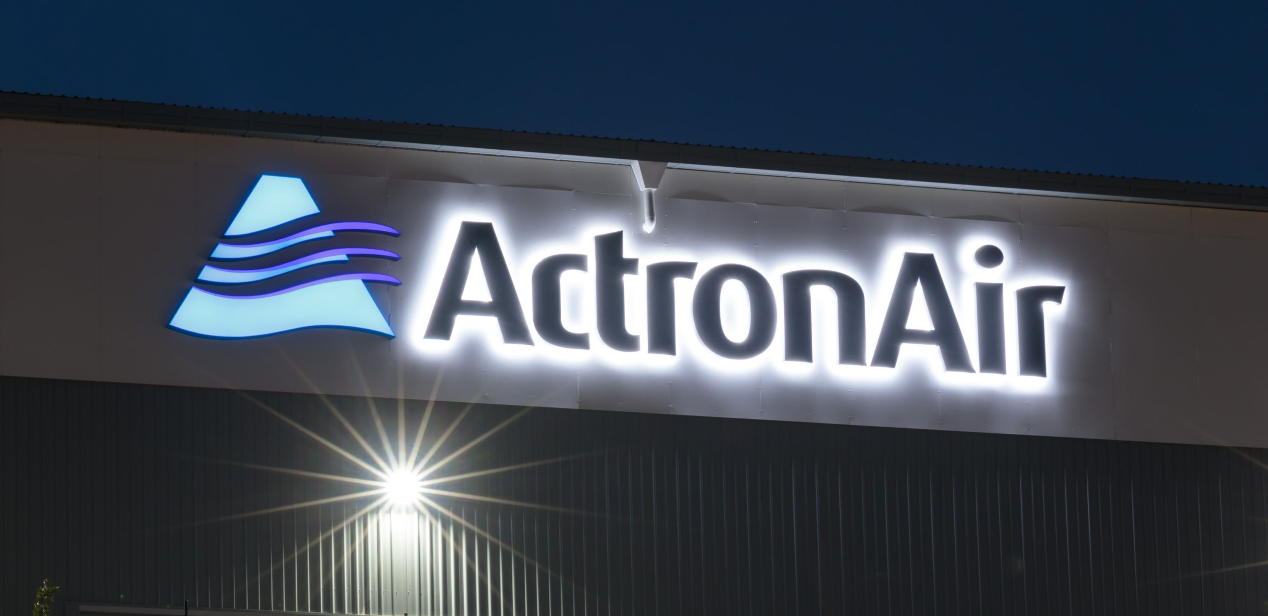 Actron Air- LED Signage at nighttime 